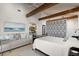 Bedroom with patterned wall and ocean view at 1309 Hill St, New Smyrna Beach, FL 32169