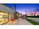 Modern home with garage, walkway, and ocean view at sunset at 1309 Hill St, New Smyrna Beach, FL 32169