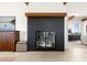 Modern fireplace with dark stone surround at 1309 Hill St, New Smyrna Beach, FL 32169