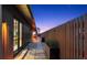 Pathway beside a home with wooden fence and landscaping at 1309 Hill St, New Smyrna Beach, FL 32169