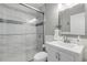 Clean bathroom with white vanity, marble shower, and modern fixtures at 142 Jean Francis Ln, Port Orange, FL 32127