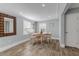 Bright dining area with wood floors and modern light fixture at 142 Jean Francis Ln, Port Orange, FL 32127