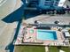 Aerial view of the pool and surrounding area at 1571 S Atlantic Ave # 4110, New Smyrna Beach, FL 32169