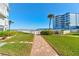 Pathway to beach and resort style pool at 1571 S Atlantic Ave # 4110, New Smyrna Beach, FL 32169