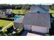 Aerial view of the property with a two-car garage at 182 Kentucky Blue Cir, Apopka, FL 32712