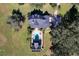 High-angle view of house, pool, and surrounding landscape at 182 Kentucky Blue Cir, Apopka, FL 32712