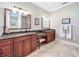 Elegant bathroom featuring dual vanities and a stylish design at 182 Kentucky Blue Cir, Apopka, FL 32712