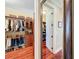 Walk-in closet with custom built-ins and ample hanging space at 182 Kentucky Blue Cir, Apopka, FL 32712