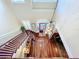 High-ceiling foyer with hardwood floors and chandelier at 182 Kentucky Blue Cir, Apopka, FL 32712