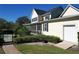 House side view with screened porch and garage at 182 Kentucky Blue Cir, Apopka, FL 32712