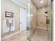 Large Primary bathroom with walk-in shower and built-in bench at 182 Kentucky Blue Cir, Apopka, FL 32712