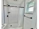 Updated bathroom with subway tile shower/tub combo at 2101 Oriole Ln, South Daytona, FL 32119