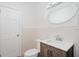 Clean bathroom with vanity and tiled walls at 211 Maurice Ave, New Smyrna Beach, FL 32168