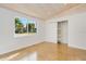 Spacious bedroom with wood ceiling and large window at 211 Maurice Ave, New Smyrna Beach, FL 32168