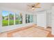 Bright bonus room with large windows, tile floors, and a closet at 211 Maurice Ave, New Smyrna Beach, FL 32168