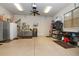 Spacious garage with ample storage and workbench at 221 Columbus Ave, New Smyrna Beach, FL 32169