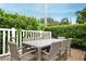 Outdoor dining area with patio furniture at 221 Columbus Ave, New Smyrna Beach, FL 32169