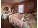 Light and airy bedroom with a queen-size bed and dresser at 2233 Austin Ave, Deltona, FL 32738