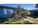 Welcoming front entrance with lush landscaping at 2233 Austin Ave, Deltona, FL 32738