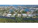 Wide aerial showcasing the property and surrounding neighborhood at 236 Quay Assisi, New Smyrna Beach, FL 32169