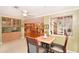 Bright breakfast nook with built-in cabinetry and view into the kitchen at 236 Quay Assisi, New Smyrna Beach, FL 32169