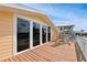 Private deck with three windows and seating area, offering water views at 236 Quay Assisi, New Smyrna Beach, FL 32169