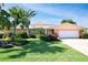 Attractive single-story home with landscaped yard and two-car garage at 236 Quay Assisi, New Smyrna Beach, FL 32169