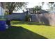 Spacious backyard with a grassy area and privacy fence at 2408 Victory Palm Dr, Edgewater, FL 32141