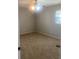 Cozy bedroom featuring a ceiling fan, carpeted floors, and a window for natural light at 2408 Victory Palm Dr, Edgewater, FL 32141