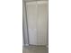 White louvered closet doors at 2408 Victory Palm Dr, Edgewater, FL 32141