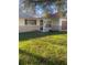 Single story home with stone and wood siding at 2408 Victory Palm Dr, Edgewater, FL 32141