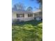 House exterior showcasing a stone facade and landscaping at 2408 Victory Palm Dr, Edgewater, FL 32141