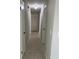 Hallway with multiple doors and tile flooring at 2408 Victory Palm Dr, Edgewater, FL 32141