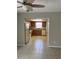 Open kitchen area with natural light and tile flooring at 2408 Victory Palm Dr, Edgewater, FL 32141