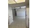 Bright living area with tile flooring, ceiling fan, and open floor plan at 2408 Victory Palm Dr, Edgewater, FL 32141