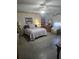 Spacious bedroom with a double bed and wood furniture at 2421 Silver Palm Dr, Edgewater, FL 32141