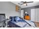 Comfortable bedroom with a desk and plenty of closet space at 2507 Milton Ave, New Smyrna Beach, FL 32168