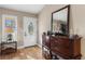 Entryway with hardwood floors, dresser, and mirror at 2507 Milton Ave, New Smyrna Beach, FL 32168