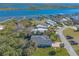 Waterfront home with spacious lot and private dock at 258 Navajo Dr, Oak Hill, FL 32759