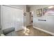 Bright hallway with double door closets and neutral decor at 258 Navajo Dr, Oak Hill, FL 32759