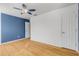 Bedroom with hardwood floors and ceiling fan at 2707 Atlantis Dr, New Smyrna Beach, FL 32168