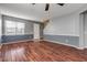 Living room with hardwood floors and ceiling fan at 2707 Atlantis Dr, New Smyrna Beach, FL 32168