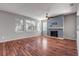 Living room with fireplace and hardwood floors at 2707 Atlantis Dr, New Smyrna Beach, FL 32168