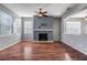 Living room with fireplace and hardwood floors at 2707 Atlantis Dr, New Smyrna Beach, FL 32168