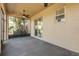 Screened porch with ceiling fan and access to backyard at 2707 Atlantis Dr, New Smyrna Beach, FL 32168