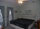 Large bedroom with king-size bed and ample natural light at 2715 Banyan Dr, Edgewater, FL 32141