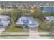 Aerial view of a charming house with a metal roof, situated in a peaceful neighborhood at 2817 Bay Side Dr, New Smyrna Beach, FL 32168