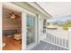 Private balcony with gray decking and white railings at 2817 Bay Side Dr, New Smyrna Beach, FL 32168