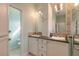 Bright bathroom with double sinks, and shower at 2817 Bay Side Dr, New Smyrna Beach, FL 32168