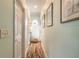 Light-colored hallway with wood flooring at 2817 Bay Side Dr, New Smyrna Beach, FL 32168